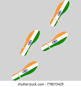 Vector illustration of chain of trails of shoes isolated on grey background, painted in the colors of national flag of India