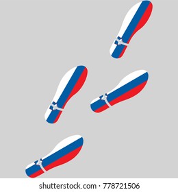 Vector illustration of chain of trails of shoes isolated on grey background, painted in the colors of national flag of Slovenia