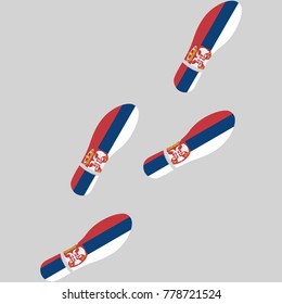 Vector illustration of chain of trails of shoes isolated on grey background, painted in the colors of national flag of Serbia