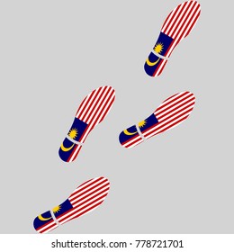 Vector illustration of chain of trails of shoes isolated on grey background, painted in the colors of national flag of Malaysia