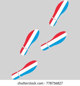 Vector illustration of chain of trails of shoes isolated on grey background, painted in the colors of national flag of Luxembourg