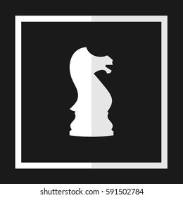 Vector illustration of chess knight icon. White chess knight icon on black background.
