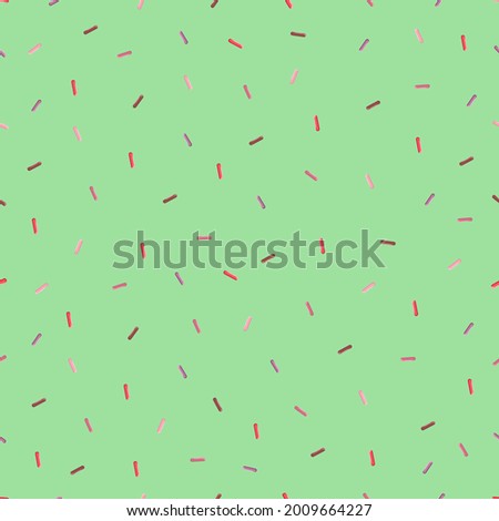 Vector illustration of chocolate grains seamless pattern. Colorful sprinkle seamless pattern. Grains pattern on green background.