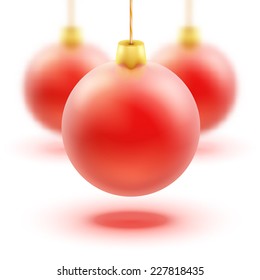 Vector illustration. Christmas balls on a white background with the effect of blurring.