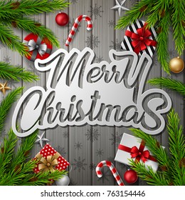 Vector illustration of Christmas gray wooden background with fir branches and christmas elements