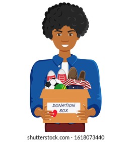 Vector Illustration of Clothes Donation with Man in Cartoon Flat Style. African Guy Holding Donation Box with Shoes, Clothes and Balls isolated. Minimalism Lifestyle, Social Care and Charity Concept