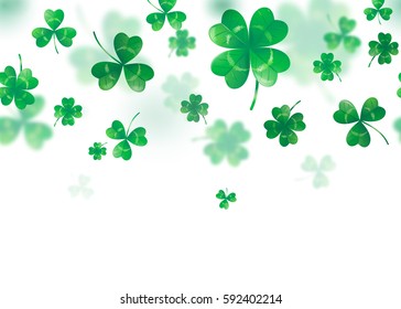 Vector illustration of clover background as a seamless border with green blur clover leaves isolated on white background for saint Patrick day greeting