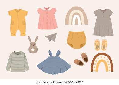 Vector illustration of a collection of baby clothes in boho style. Modern nursery apparel clipart. Cartoon characters. Scandinavian. Perfect for nursery room decor, fashion design.