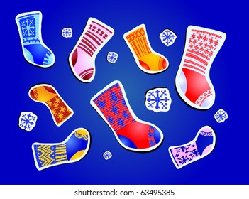 Vector illustration of collection of socks with snowflake over blue background