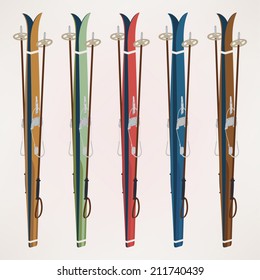 Vector illustration with color variations: pair of old fashioned alpine skis and poles putted together and ready for carry  