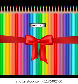 Vector illustration of colored pencils gift with red bow