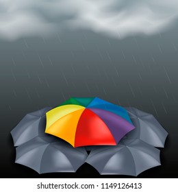 Vector illustration colored rainbow  umbrella und gray umbrellas with heavy fall rain in the dark sky.