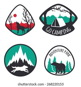 Vector illustration. Colored set of camping emblems, labels and logos with mountains, trees, deers, wolves and bear. Hunting, traveling, sunrise, mountains, outdoor and nature lifestyle