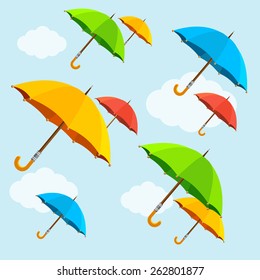 Vector illustration colorful umbrellas fly with clouds in the sky. Flat Design