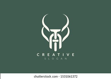 Vector illustration of combined shape of animal horn with letters A and T. Minimalist and simple logo design, flat style, modern icon and symbol