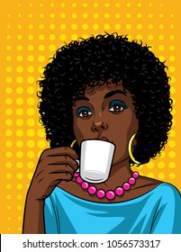 Vector illustration in comic art style of  beautiful african american woman with cup of coffee. Fashionable lady drinking a coffee over halftone dot background