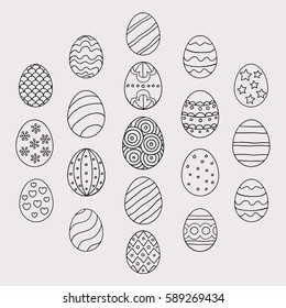 Vector illustration: composition of  black egg icons with ornament in form of hexagon for Easter holidays design isolated on gray background.