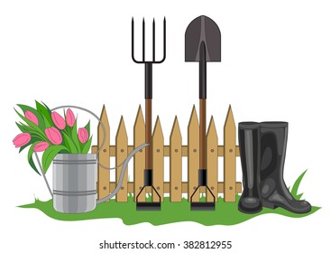 Vector illustration of the composition of the garden fence, watering can with tulips, black boots, pitchfork and shovel standing in the green spring grass