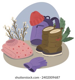 Vector illustration with a composition of warm clothes and accessories for active winter recreation and walks in nature - a wool sweater and hat, gloves, warm winter boots and a comfortable backpack.
