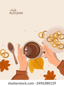 Vector illustration. Cozy autumn banner, postcard, cover, poster. Hands holding a cup of coffee, autumn leaves, cookies. Autumn mood. Modern design.