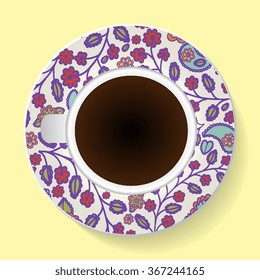 Vector illustration with a cup of coffee and a pattern on the saucer