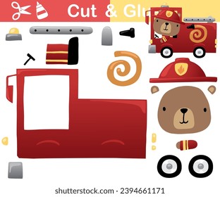 Vector illustration of cute bear cartoon on fire truck. Education paper game for kids. Cut and glue