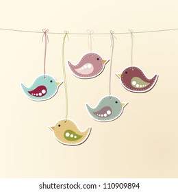 Vector illustration of cute birds hanging on a string.