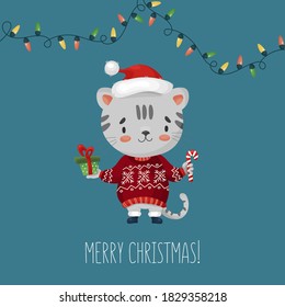 vector illustration of cute cartoon cat wearing a sweater and christmas garland.  merry christmas greeting card with a cat in a hat