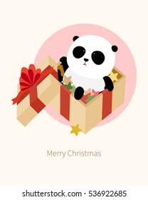 Vector Illustration: A cute cartoon giant panda is sitting in a christmas present box filled with colorful stars and wrapped with golden wrapping paper and red ribbons