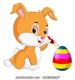 vector illustration of Cute Easter Bunny painting an egg