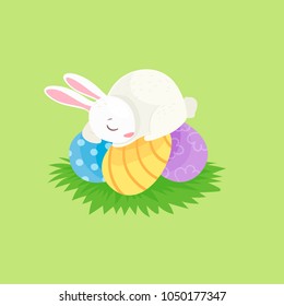 vector illustration of cute easter bunny asleep on eggs. With copy space for text