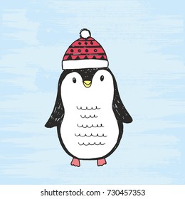 Vector illustration of cute hand drawn black and white penguin with a cap. Drawing isolated on a grunge blue background.