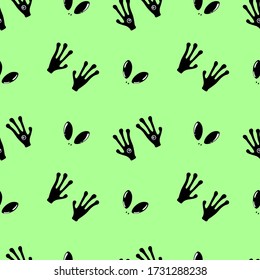 Vector illustration. Cute seamless pattern with eyes and hands alien isolated on green. Hand drawn simple doodle clipart. Space theme. Ideal for textile, poster, banner, gift wrapping.