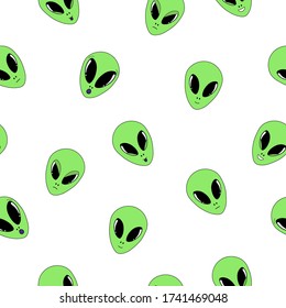 Vector illustration. Cute seamless pattern with green alien faces with different emotions isolated on white. Hand drawn doodle clipart. Space theme. Ideal for textile, poster, banner, gift wrapping.