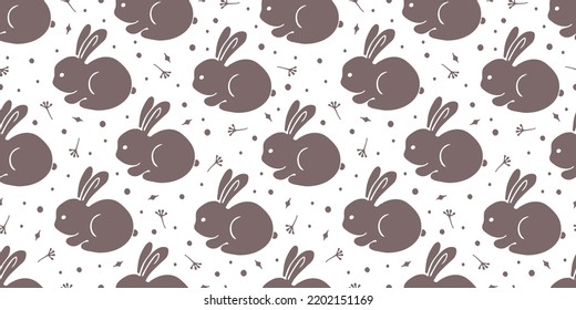 Vector illustration. Cute Seamless pattern with beige silhouettes of Rabbits, hearts and dots isolated on white. Happy Easter theme. Hand drawn doodle clipart. For gift wrap, print, fabric, textile.