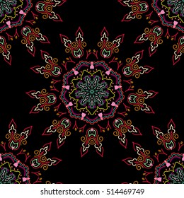 Vector illustration. Cutout paper lace texture, vector tulle background, swirly seamless pattern in green, pink and red colors.