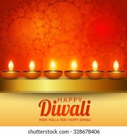 Vector illustration of decorated Diwali diya on colorful background.
