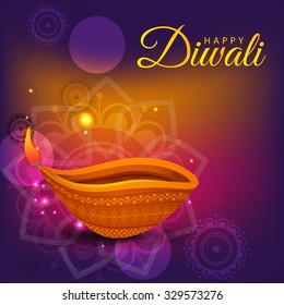 Vector illustration of decorated Diwali diya on colorful background.
