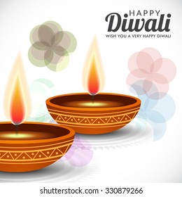 Vector illustration of decorated Diwali diya on colorful background.