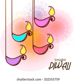 Vector illustration of decorated Diwali diya on colorful background.