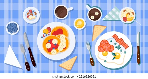 Vector illustration of a delicious breakfast for two. View from above. Plates with scrambled eggs, bacon and a plate with pancakes, fruits and berries. Breakfast with a cup of tea or coffee.