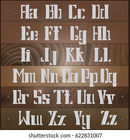 

Vector illustration depicting the Latin alphabet in the form of a stencil on the boards
