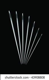 A vector illustration of different size needles isolated on black