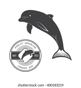 Vector illustration of a dolphin in the old-fashioned style and line-art style. For labels and banners.