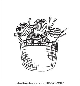 vector illustration in doodle style basket with yarn for knitting, knitting needles, crochet hook. cozy basket for home crafts, hobby symbol, handmade