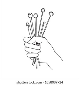 vector illustration drawing in doodle style. knitting needles and crochet hooks in hand. a simple drawing on the topic of needlework, knitting, crocheting. hobbies and homework.