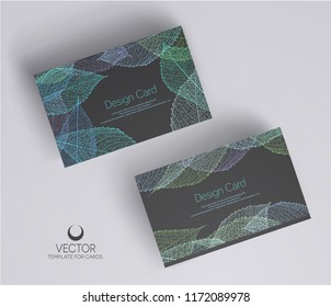 Vector illustration. Drawn leaves on dark grey  background. Set of templates, modern, stylish business cards.