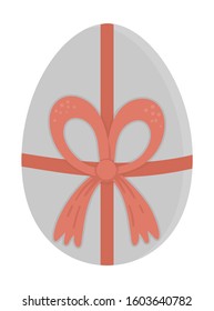 Vector illustration of an egg in with bow isolated on white background. Easter traditional symbol and design element. Cute spring icon picture