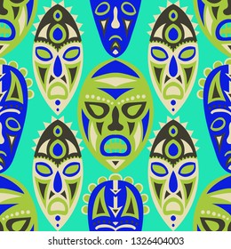 Vector Illustration. Ethnic Seamless Pattern with Color Masks for Print or Card. Ethnic Seamless Pattern with Color Trible Shamanic Masks for your Design. Vector Texture.