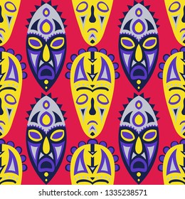 Vector Illustration. Ethnic Seamless Pattern with Color Masks for Print or Card. Ethnic Seamless Background with Color Trible Ritual Masks for your Design. Vector Texture.